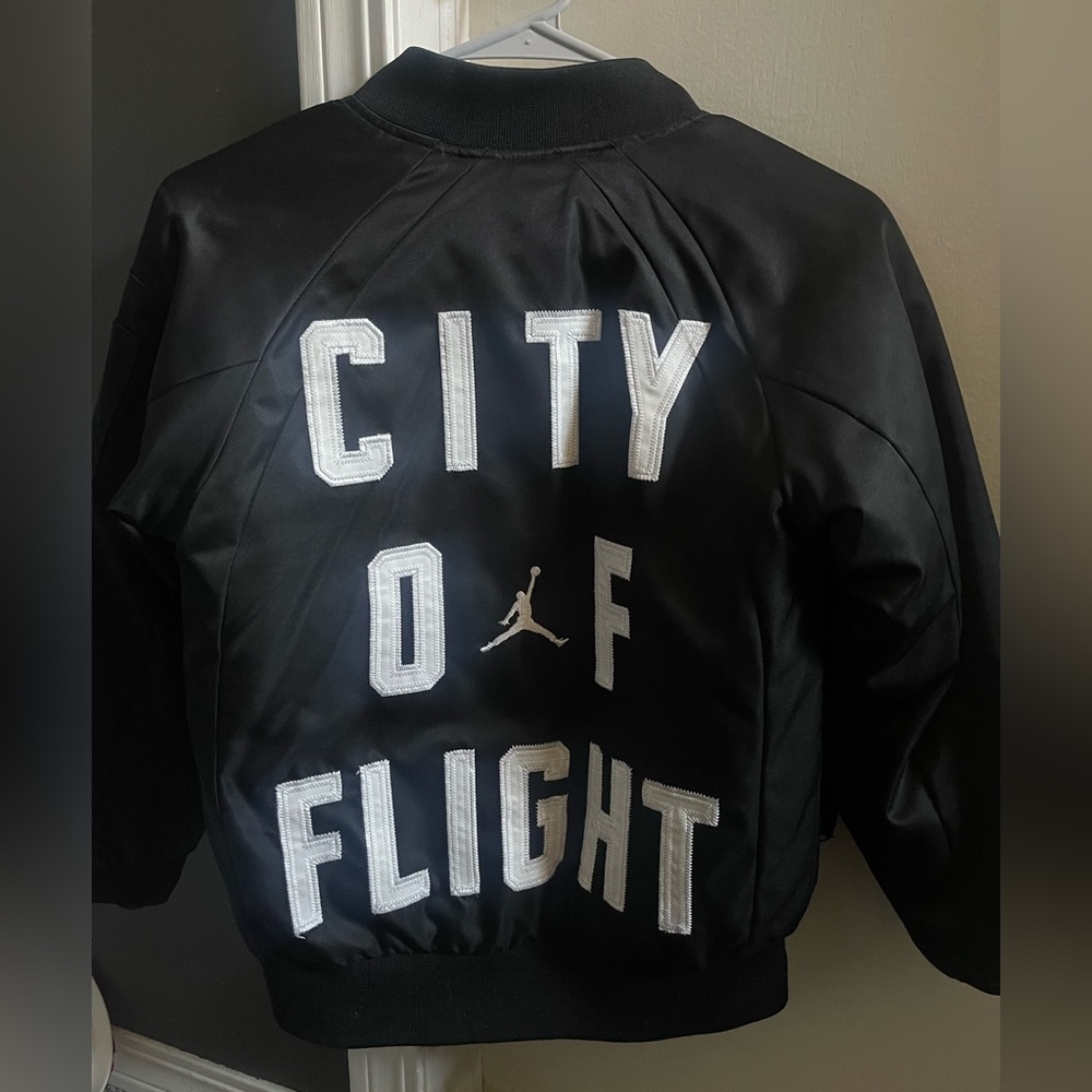 Youth Small “City Of Flight” Jordan Reversible Jacket. Tears On Black Side.